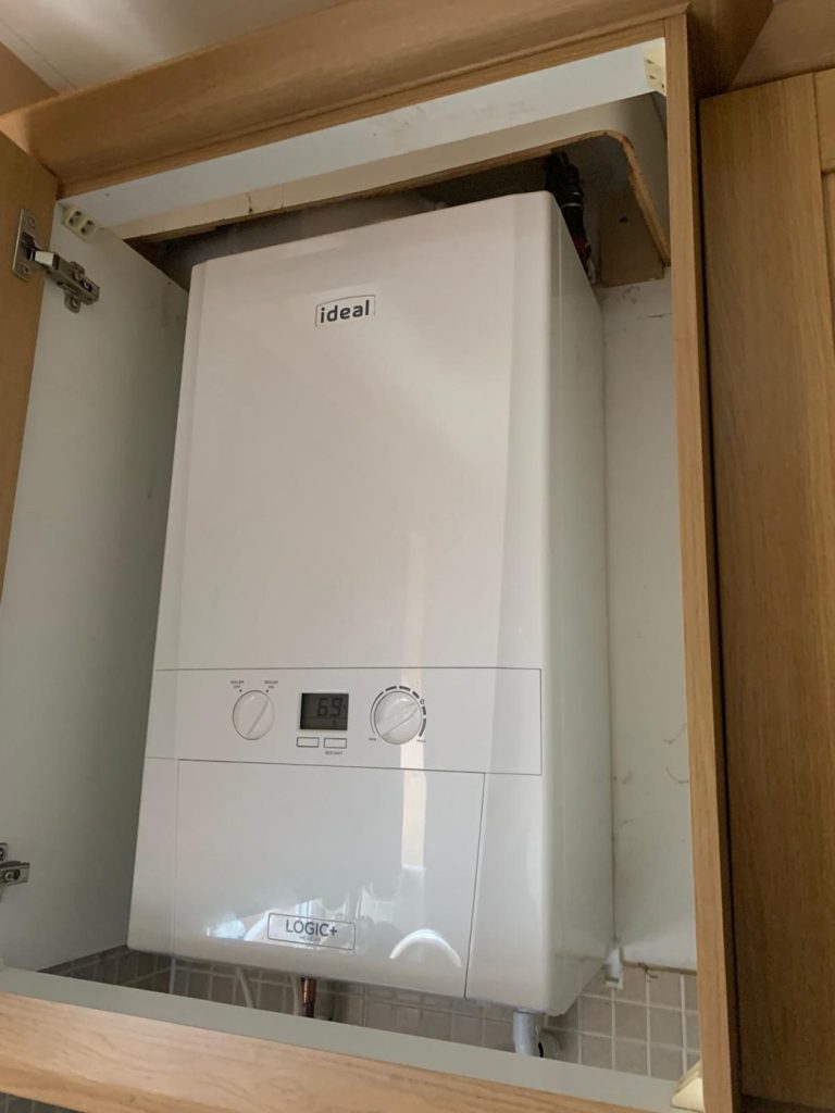 Ideal Logic+ boiler fitted inside a kitchen wall unit