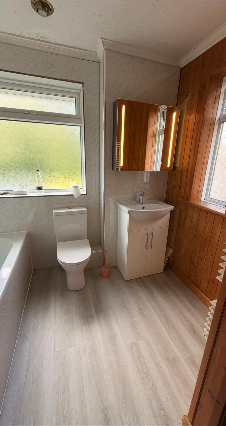 Complete bathroom refit with new suite and flooring